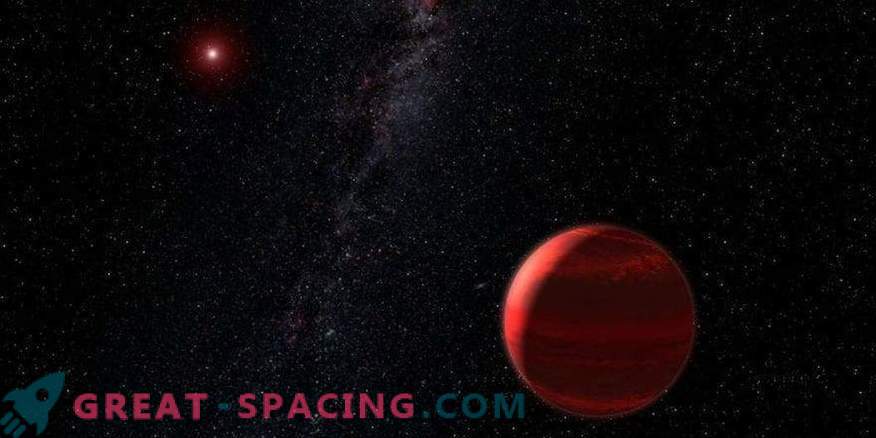 Червено джудже, което се крие в праха на гигантска звезда
